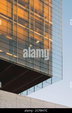 Rectangular on wall of building with dark contrast shadow in sunset light Stock Photo