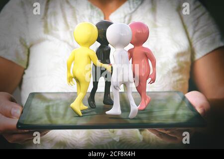 Men of different races stand in a circle on the tablet. Concept of multiculturalism, understanding between races and peace, international exchange and Stock Photo