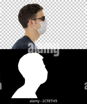 Blind man walking in medical mask and dark glasses, Alpha Channe Stock Photo