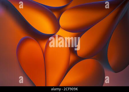 abstract orange background with glowing bubbles of different shapes and colors Stock Photo