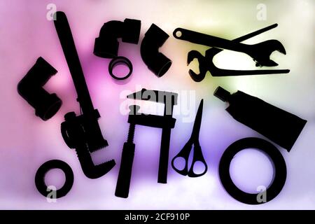 Set of various craft tools on colorful background Stock Photo