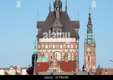 Gothic Mansion of the Society of Saint George, Gothic Wieza Wiezienna of Ulica Dluga Barbican, Gothic Ratusz Glownego Miasta (Main Town Hall) in Main Stock Photo