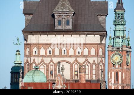 Gothic Mansion of the Society of Saint George, Gothic Wieza Wiezienna of Ulica Dluga Barbican, Gothic Ratusz Glownego Miasta (Main Town Hall) in Main Stock Photo