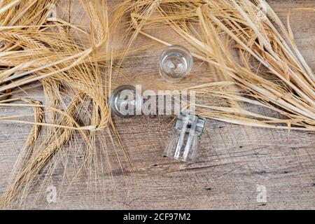Clear whiskey shots on wooden table Stock Photo