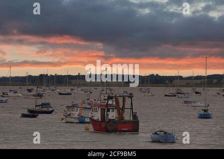 Felixstowe Ferry Suffolk's quirky 'olde World' fishing village viewed as the sun rises Stock Photo