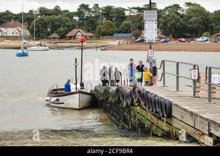 The Ferry at Felixstowe Ferry Suffolk's quirky 'olde World' fishing village disembark's foot passengers Stock Photo