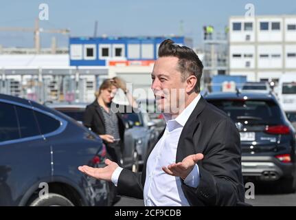 03 September 2020, Brandenburg, Grünheide: Elon Musk, Tesla boss, comes to the construction site of the Tesla Giga Factory. In Grünheide near Berlin, a maximum of 500,000 vehicles per year are to roll off the assembly line from July 2021 - and according to the car manufacturer's plans, the maximum is to be reached as quickly as possible. Photo: Patrick Pleul/dpa-Zentralbild/ZB Stock Photo