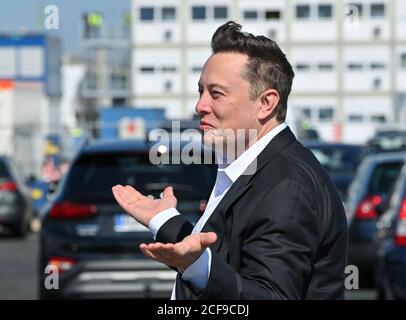 03 September 2020, Brandenburg, Grünheide: Elon Musk, Tesla boss, comes to the construction site of the Tesla Giga Factory. In Grünheide near Berlin, a maximum of 500,000 vehicles per year are to roll off the assembly line from July 2021 - and according to the car manufacturer's plans, the maximum is to be reached as quickly as possible. Photo: Patrick Pleul/dpa-Zentralbild/ZB Stock Photo