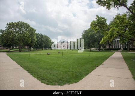 Champaign-Urbana, IL, United States-April 30, 2014: University of Illinois campus quad with Foellinger Auditorium in Champaign-Urbana, Illinois Stock Photo