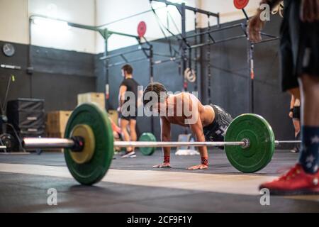 Fit man doing push-ups Stock Photo