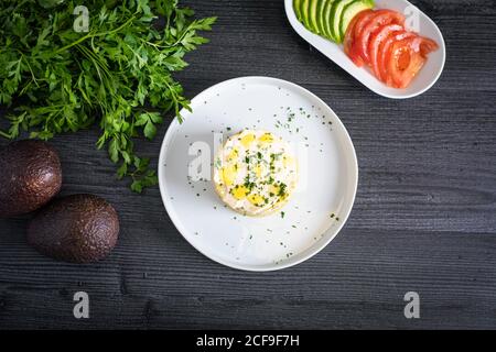 Fresh aromatic Lima cause of tuna with sliced vegetables Stock Photo