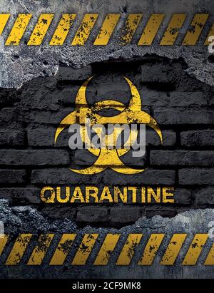 Quarantine sign on old brick wall background Stock Photo