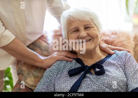 Woman spending time with her elderly mother Stock Photo