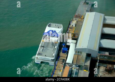 The Wightlink Ferry at the dockside by Portsmouth Harbour railway station, Hampshire, England, seen from the Spinnaker Tower Stock Photo