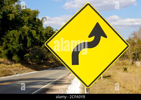 warning traffic sign - sharp right curve - S curve Stock Photo