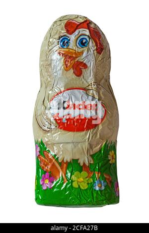 Kinder Easter hen chick chocolate isolated on white background - fine milk chocolate shell with milky white lining - ready for Easter Stock Photo