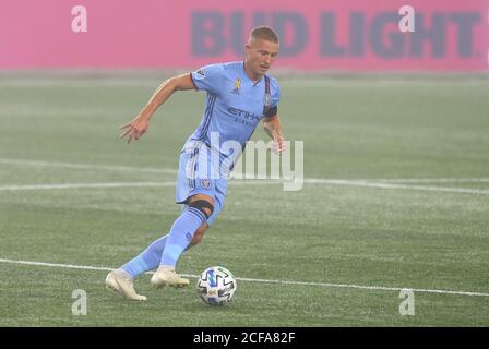 Alexander Callens (6) of NYCFC scored goal with header shot during MLS  regular season game against New England Revolution at Yankee stadium. Game  was played without fans because of COVID-19 pandemic precaution.