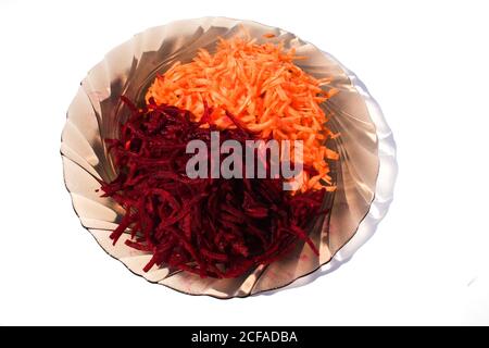 Platel of freshly cut vegetables isolated on a white background Stock Photo