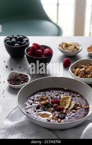 Healthy acai bowls with ingredients Stock Photo