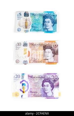 Sample. Money Notes New British polymer £5, £10 and £20 banknote and a pound coin Stock ...