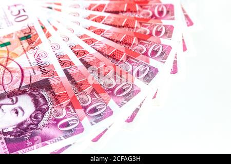 A fan of 50 British pound notes in studio Stock Photo