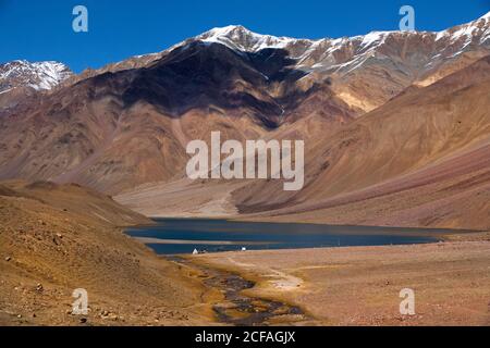 Abstract patterns and textures of hills with moderate vegetation, rivers, lakes, clouds and clear sky of high altitude cold desert - Spiti Vally. Stock Photo