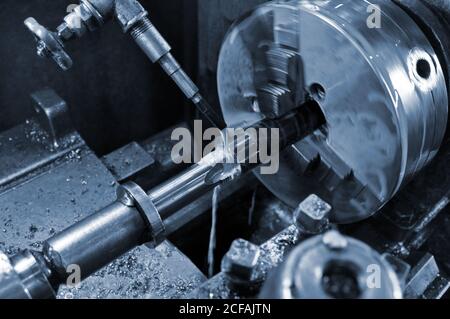 Metalworking machine at work. Lubricating and cooling fluid Stock Photo