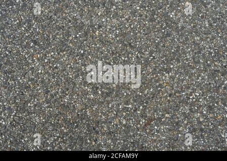 Smooth Grey Asphalt Pavement Texture With Small Rocks. Top View Of