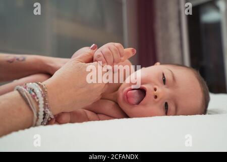 Portrait of cute baby boy with Down syndrome Stock Photo