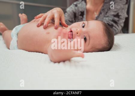 Portrait of cute baby boy with Down syndrome Stock Photo