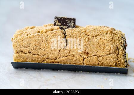 Arctic Cake Milky Roll Dessert with Biscuit Powder and Banana. Ready to Serve and Eat. Stock Photo