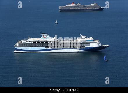 Some of the World's leading Ocean going cruise liners have been moored in Weymouth Bay, near Portland, during the 2020 Covid Pandemic. Stock Photo