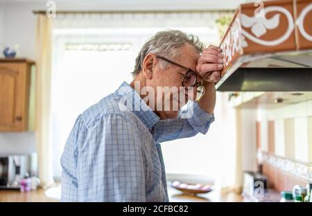 Portrait of senior man looking depressed Stock Photo