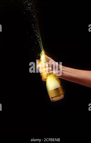 Crop anonymous hand of person in latex blue glove with clenched fist ...
