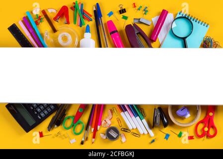 School supplies on yellow background Stock Photo