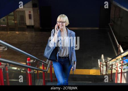 Blonde businessWoman talking on smartphone Stock Photo