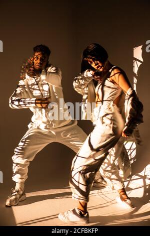 Trendy dancers posing for camera Stock Photo