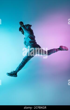 anonymous dancer jumping high Stock Photo