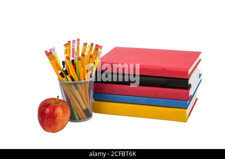 Colorful horizontal photo of a stack of books with an apple and colorful pencils. Isolated on a white background. Stock Photo