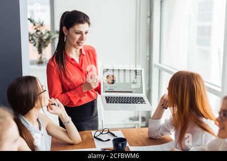 Business owner of a coffee roastery checking his laptop Stock Photo