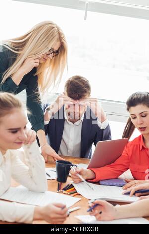 Smart businessman thinking about something in office Stock Photo