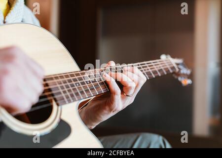 Detail of a man playing the guitar Stock Photo