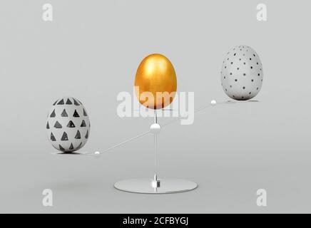 Balance concept with painted decorated easter eggs on grey background Stock Photo