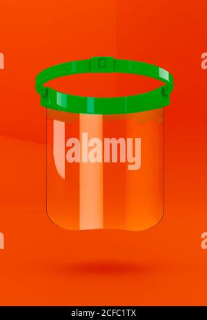 Transparent protective mask for the Coronavirus pandemic on orange background Stock Photo