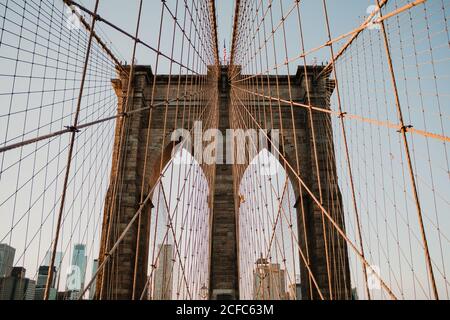 Perspective view of beautiful bridge gates with cables on background of New York city Stock Photo