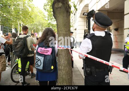 Department of Transport, Central London, UK, 4th September, 2020; Climate activists from Extinction Rebellion glued themselves to the doors of the Department of Transport, whilst other activists came to support them, the protests was aimed at HS2 construction, Credit Natasha Quaermby/ALAMY Live Stock Photo