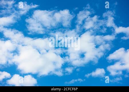 White clouds in the blue sky, may be used as background Stock Photo