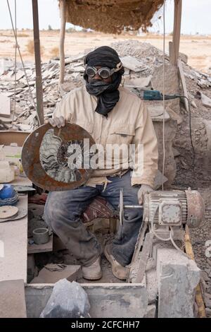 a worker, Erfoud, Macro Fossiles Kasbah, Morocco, middle aged man, labourer, stone polisher, archaeology