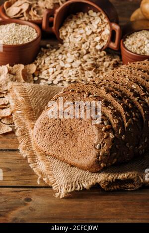 Freshly baked rye bread on napkin on table Stock Photo