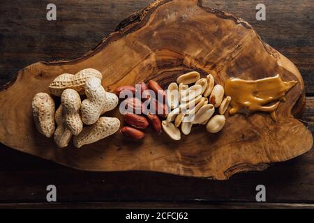 Group of peanuts on wooden boards Stock Photo